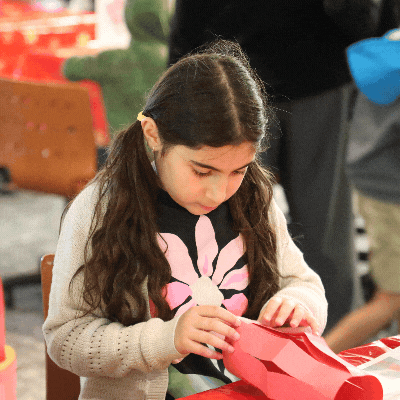East Anaheim Branch - Image of a child participating in a Lunar New Year craft
