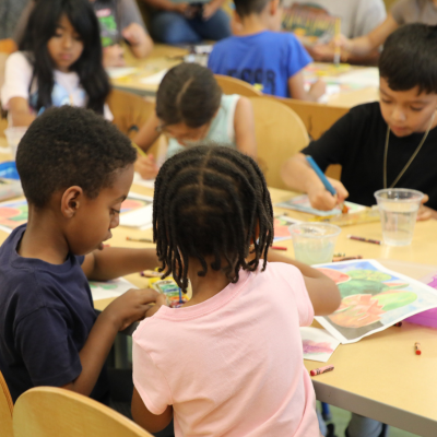 Central Library - Image of program attendees working on a directed art craft