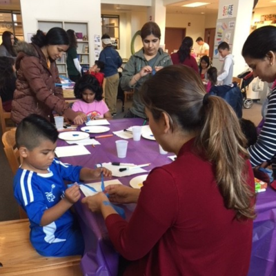 Ponderosa Joint-Use Branch image of a child participating during a crafting program