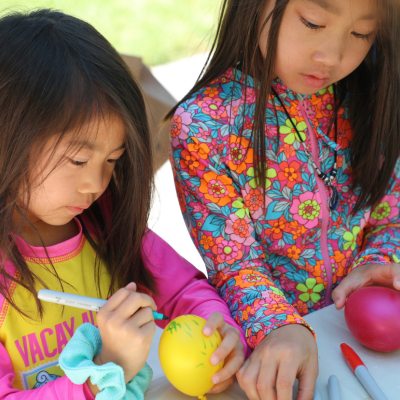 Sunkist Branch image of two children writing on balloons