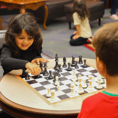 Image of three teens seating painting