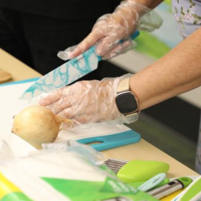 Sunkist Branch image of child sitting in her mother's lap watching straight ahead