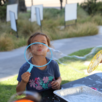 East Anaheim Branch - Image of a girl blowing a bubble
