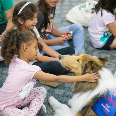 Sunkist Branch image of kids petting a dog