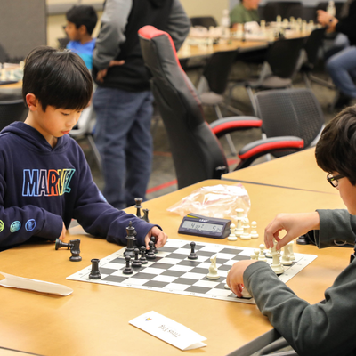 Haskett Branch Image of two kids playing chess